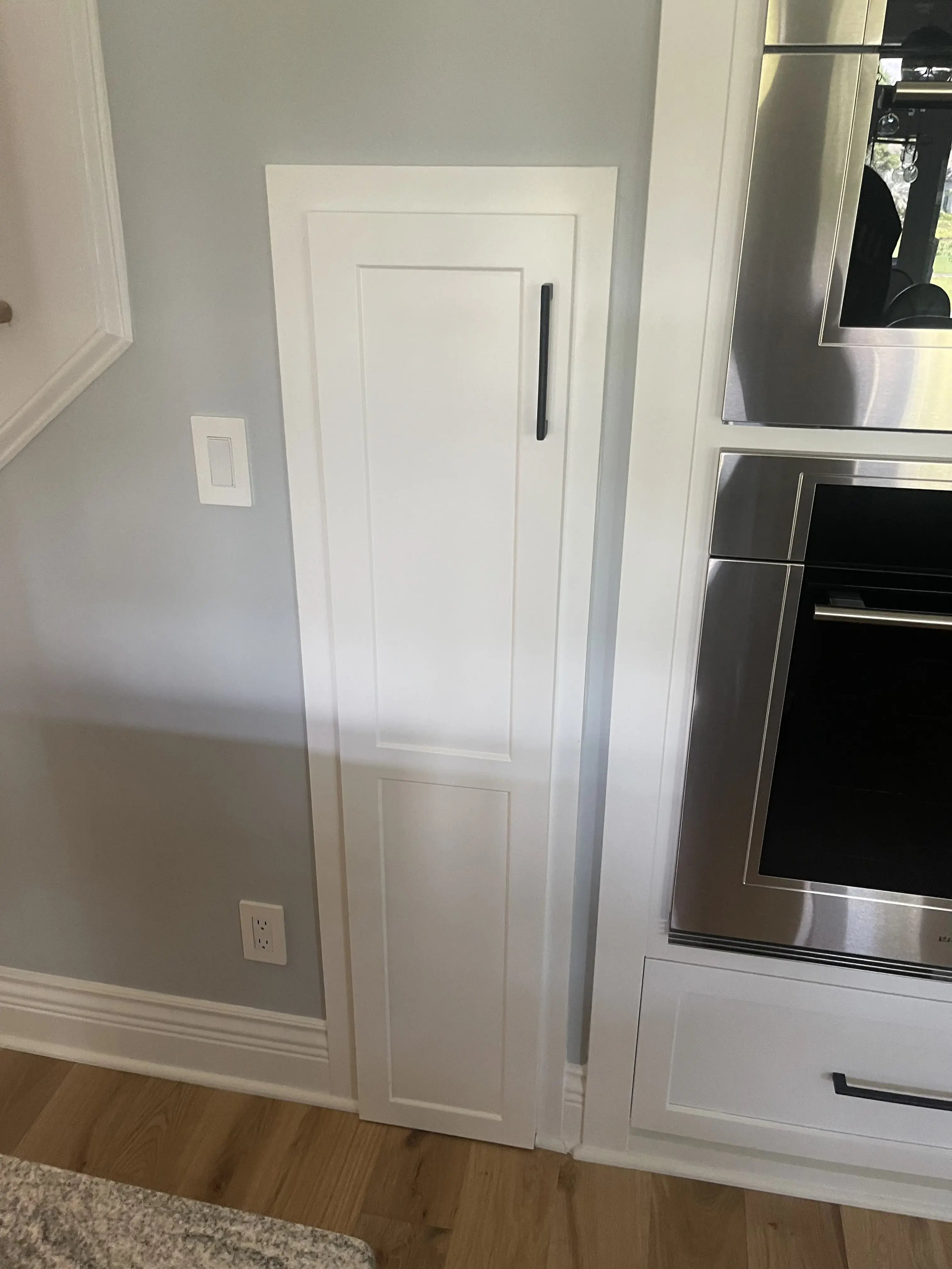 Pull Out Kitchen Pantry Cabinet by Bleu Ribbon Design & Remodeling